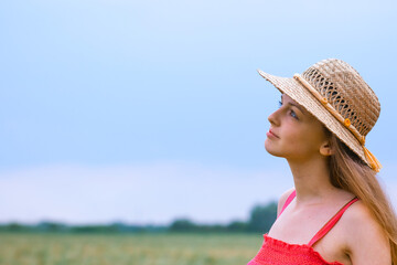 Portrait Happy Girl in a Wheat Field - 745237378