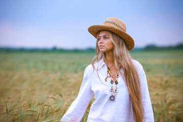 Happy Girl in a Wheat Field - 745237397