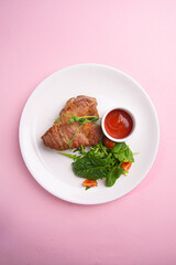 Meat steak with tomato sauce and herbs