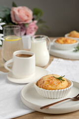 Baking tart pie portioned with a cup of coffee on the table