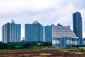 Highrise buildings skyscrapers streets city cityscape in Pattaya Thailand.