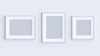 White photo frames mockup. Set collection on white wall, interior decoration. Realistic frame set on the wall.