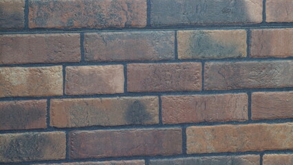 Full screen Background wallpaper of greyish brown brick wall
