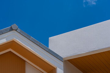 facade of a building and roof with blue sky - obrazy, fototapety, plakaty
