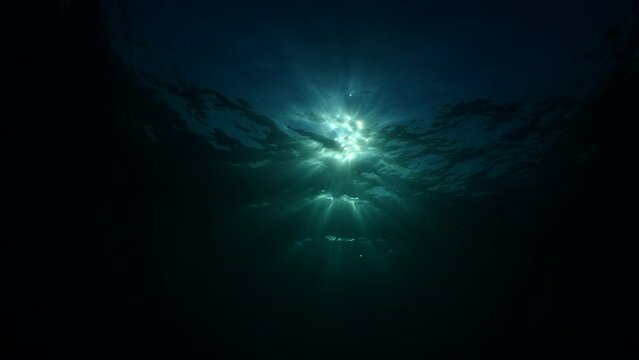 sun ray and sun beam scenery underwater waves on surface of water slow ocean scenery for background