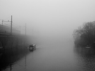 Boat on a fogy spree river, Berlin 2023