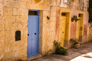 Colorful wooden doors in the historic centers of Malta - 745269544