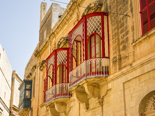 Balconies with worked structure in the center of Mdina (Malta) - 745270721