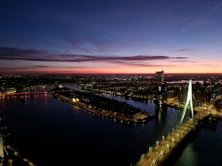 Pink sky - Aerial view of the skyline of Rotterdam at sunrise