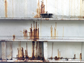 Rusty Metal Silo Building Close Up With Water Lines