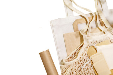 Eco friendly shopping, delivery service. Sustainable still life with textile bags, paper bag, mesh...