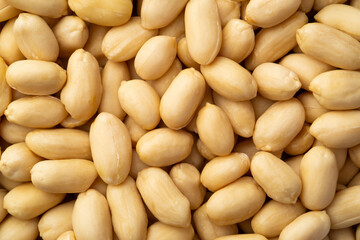 Close up Raw Uncooked peeled peanuts for background.Top view