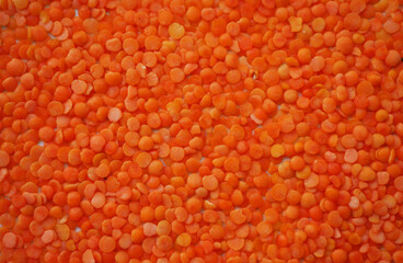 Red lentil texture. Vegan protein. Food background. 