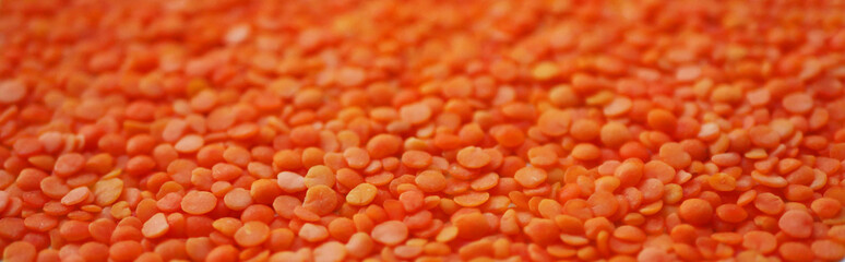 Red lentil texture. Vegan protein. Food background. 
