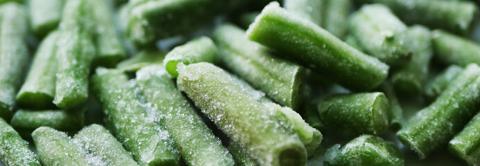 Frozen Green beans texture. Food background. Vegan ingredients 