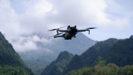 Fototapeta na wymiar Drone Flying in Nawang Jagad to Photograph Views of Mount Merapi