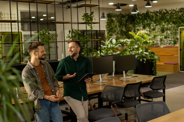 Collaborative Discussion in a Modern Office With Exposed Brick Walls