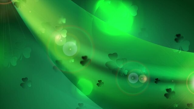 St Patrick Day emerald green abstract background with shamrock leaves, waves and glowing lights. Seamless looping motion design. Video animation Ultra HD 4K 3840x2160