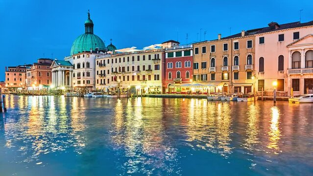 VENICE, ITALY - APRIL 23, 2018: View on San Simeone Piccolo and Grand Channel. Night by light of lanterns old. San Simeone e Giuda is church in sestiere of Santa Croce in Venice, northern Italy.