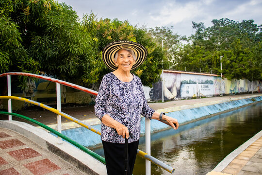 Senior woman tourist at the Macondo Linear Park in Aracataca the birthplace of the Colombian Literature Nobel Prize Gabriel Garcia Marquez