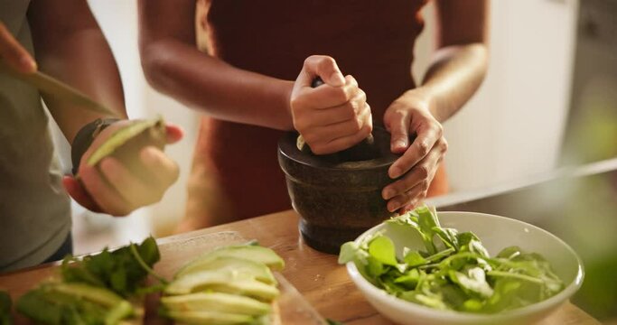 Food, hands or couple in kitchen with avocado, salad or vegetarian meal prep closeup. Cooking, health or people in house with ingredients for green brunch, diet or superfoods, nutrition or raw eating
