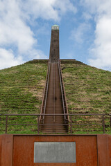 Pyramid of Austerlitz Utrecht Netherlands on sunny day. Stepped monument mound made from earth by Napoleon's forces. High vantage point with observation lookout obelisk now tourist attraction 