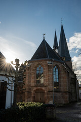 Reformed church or Maartenskerk in Doorn Netherlands on sunny day with sunbeams.  Religious Dutch historic building place of worship in community originally known as St. Maarten