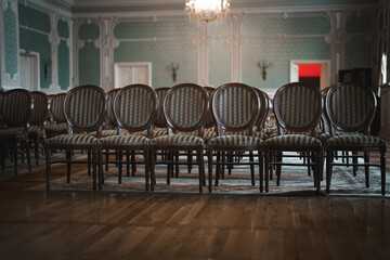 Baroque-Style Chairs Side by Side in a Castle Palace