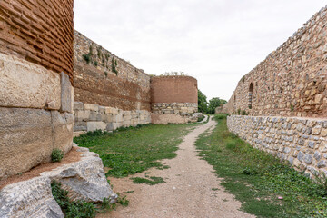 Fototapeta na wymiar ancient Iznik Castle. Lefke Gate. Historical stone walls and doors of Iznik, Bursa.