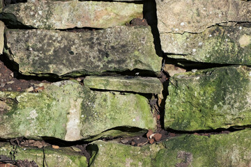 Closeup of 18th century stone wall texture in Latvia old village house