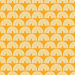 Orange seamless pattern with white rainbows
