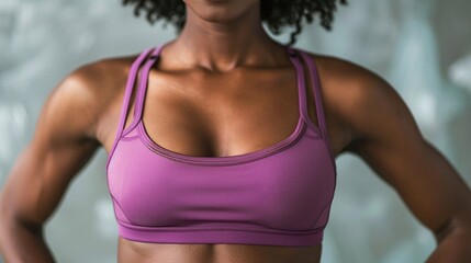 well defined torso of afro american fitness model in purple top, displaying muscular abdominal muscles with copy space for text - obrazy, fototapety, plakaty