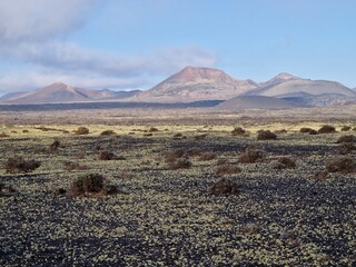 Low hanging clouds over volcano in Lanzarote, Canary Islands, Spain