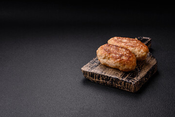 Delicious fresh fried minced fish cutlets with spices and herbs
