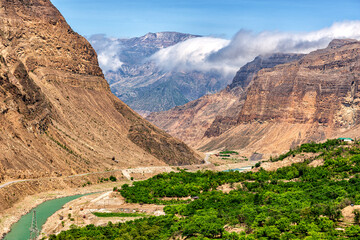 Naklejka premium Gorge with a valley and a river in the mountains of the Caucasus in Dagestan