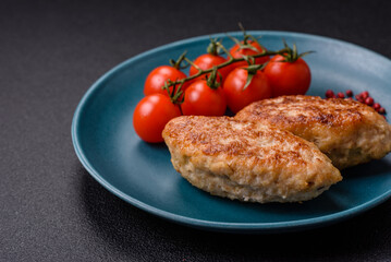 Delicious fresh fried minced fish cutlets with spices and herbs