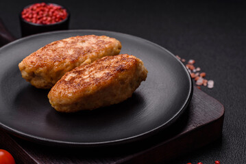 Delicious fresh fried minced fish cutlets with spices and herbs