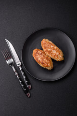 Delicious fresh fried minced fish cutlets with spices and herbs