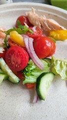 fresh vegetable salad, tomatoes, cucumbers, sweet peppers, food on a plate, 