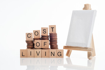 cost of living rise with copy space and easel