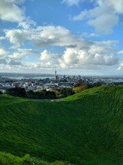  Mount Eden (Maungawhau) volcano crater in Auckland, New Zealand with panoramic view of Auckland