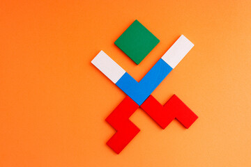 Obraz premium Man formed with wooden figures that are part of a puzzle