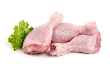 Raw chicken drumsticks, isolated on white background.