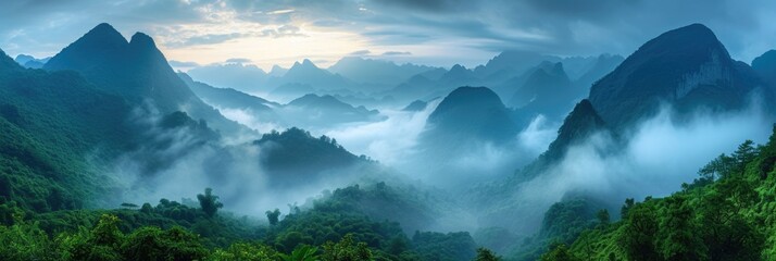 Majestic Green Mountains shrouded in morning mist - obrazy, fototapety, plakaty