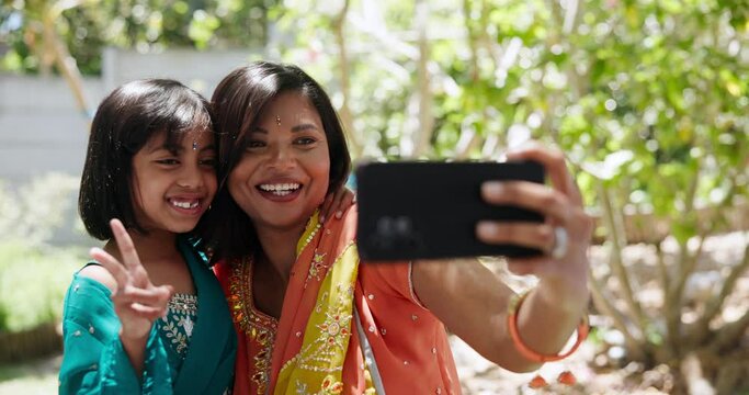 Mom, girl and selfie in home garden with peace sign, social media or care for post on blog. Indian family house, mother and daughter with photography, love or traditional clothes for memory in Mumbai