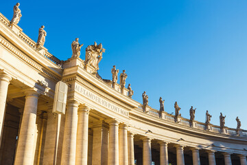 Fototapeta na wymiar Statues atop St. Peter's Basilica, Vatican City, Rome