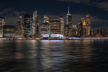 Fototapeta na wymiar New York skyline with east river at night