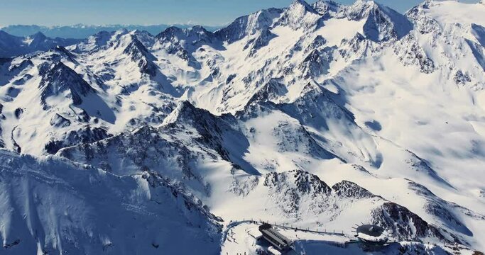 Aerial view footage of beautiful panoramic winter ski track in Alps, Solden ski resort, Tyrol, Austria.