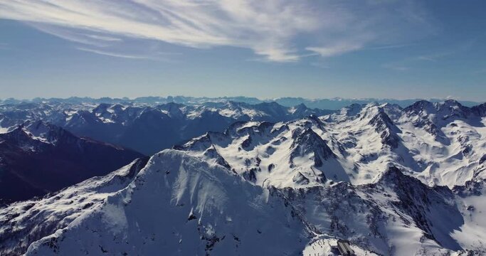 Aerial view footage of beautiful panoramic winter ski track in Alps, Solden ski resort, Tyrol, Austria.
