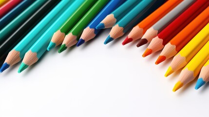 colored sharpened pencils on a white background, school supplies for drawing
